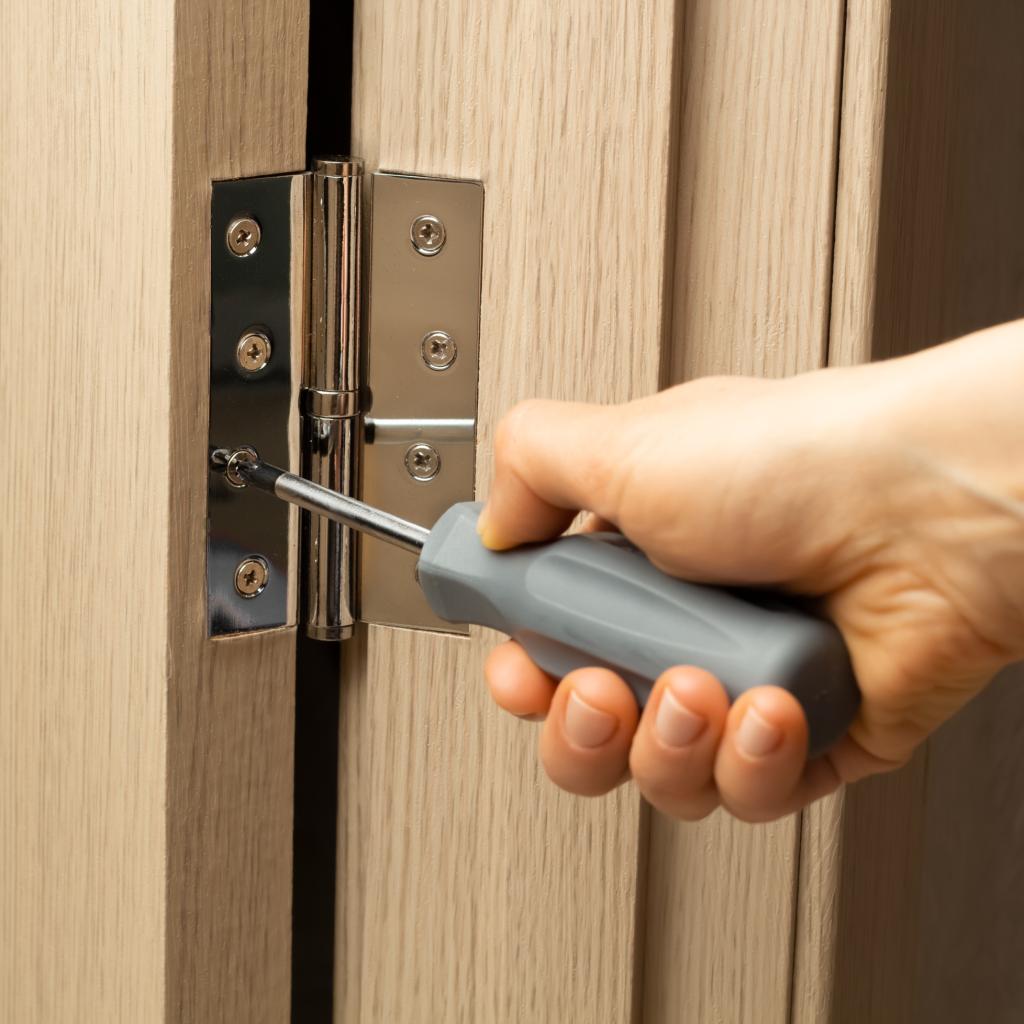 Property manager receiving scheduled door maintenance service in Washington DC