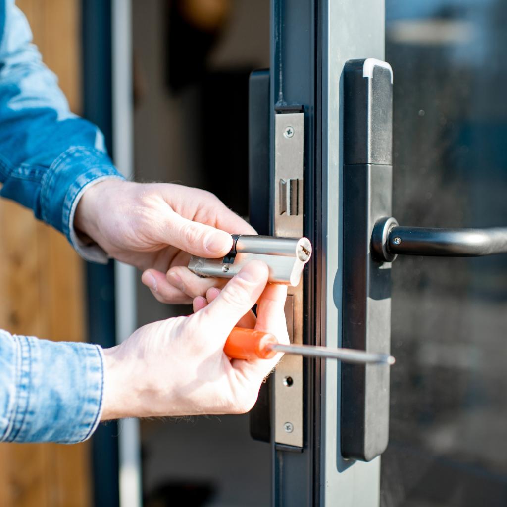 Locksmith rekeying door in Chevy Chase MD